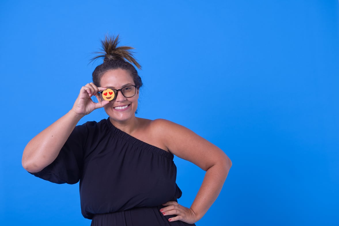 Bold & Punchy Headshots Portrait of Woman Holding an Emoji